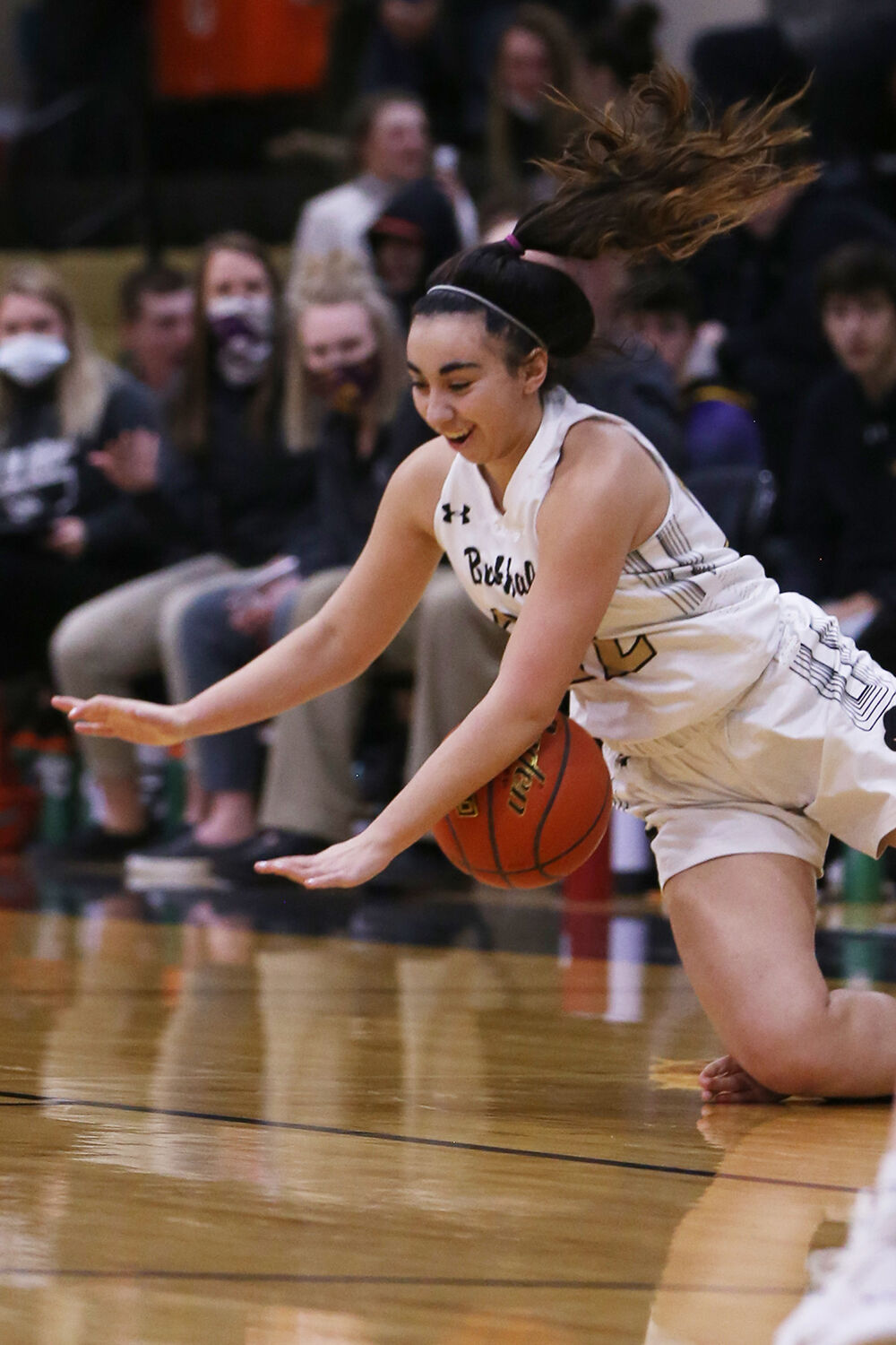 Cantrell Rosalez falls over the ball after stealing it away
